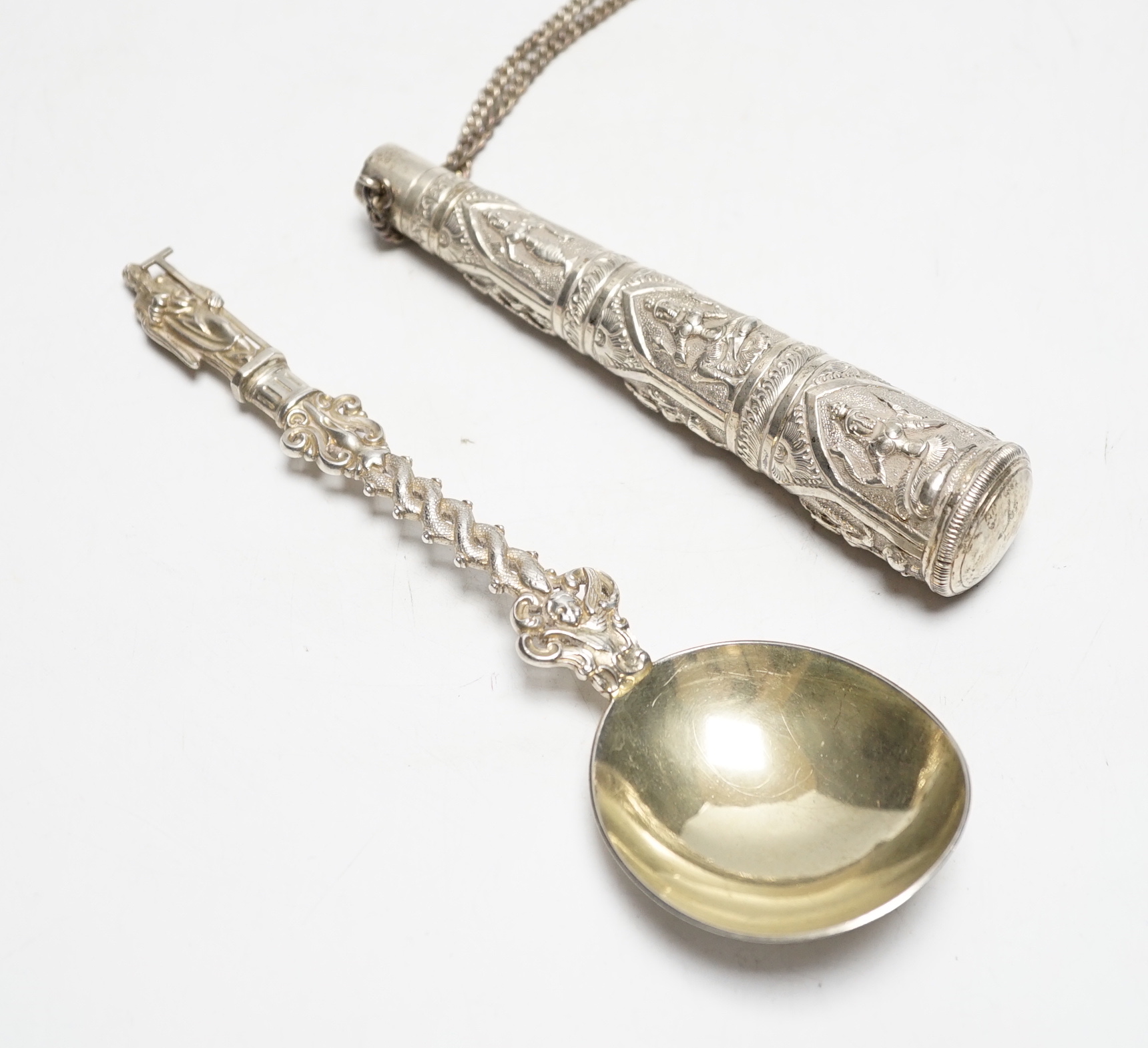 A Victorian silver apostle spoon, Francis Higgins, London, 1884, 20.2cm and an Indian white metal cane handle.